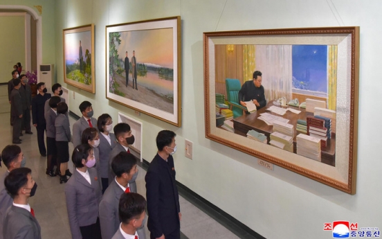 N. Korea urges 'absolute trust' in its leader, marking his father's death anniversary