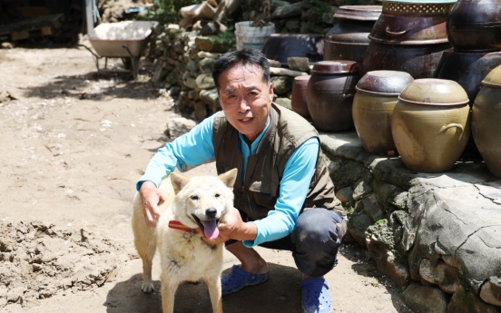 Dog makes miraculous return in village destroyed by landslide
