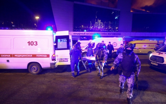Russia says 60 dead, 145 injured in concert hall raid; Islamic State group claims responsibility