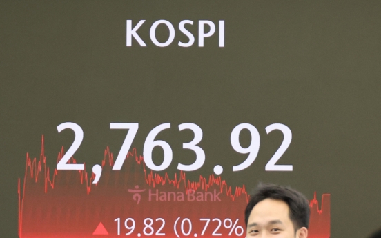 Seoul shares hit over 2-yr high on strong foreign buying