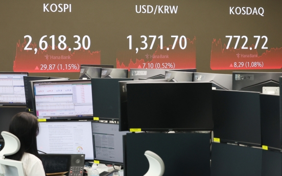 Seoul shares spike over 1% on eased US recession woes