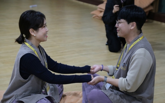 Buddhist temple plays matchmaker for 7 couples