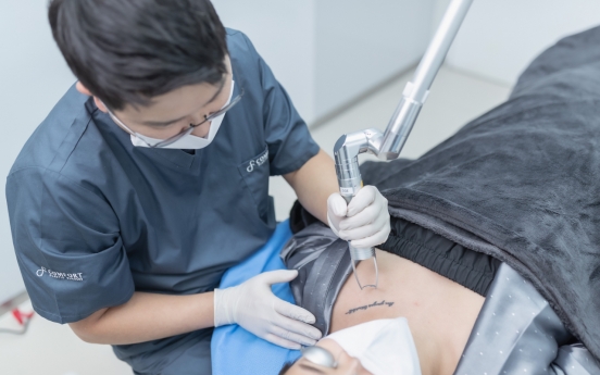 Doctor eases pain of tattoo regrets