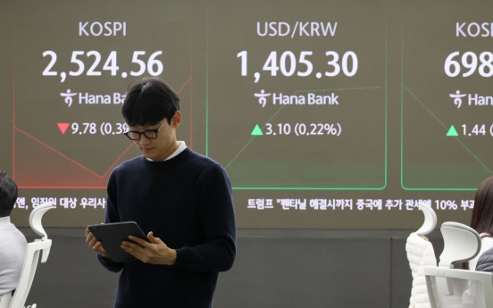 Seoul shares fall on profit taking, Trump tariff warning