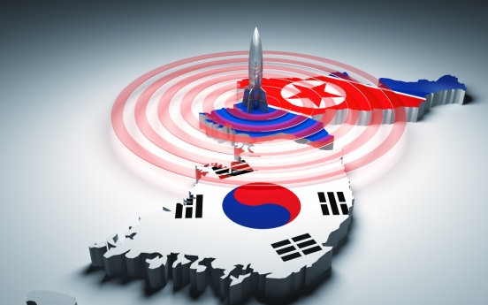 One-third in global poll see NK denuclearization as key to unification