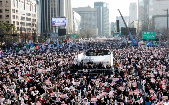 [From the Scene] Yoon supporters at Gwanghwamun call impeachment vote ‘invalid’