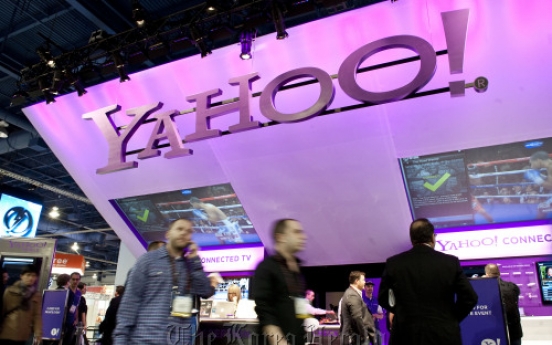 Yahoo’s earnings double despite ebbing revenue