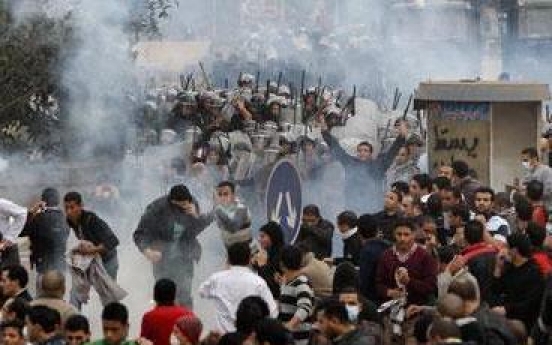 Bloody clashes rock Cairo as regime stands firm