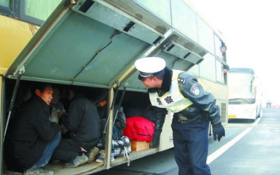 7 found hiding in bus luggage hold