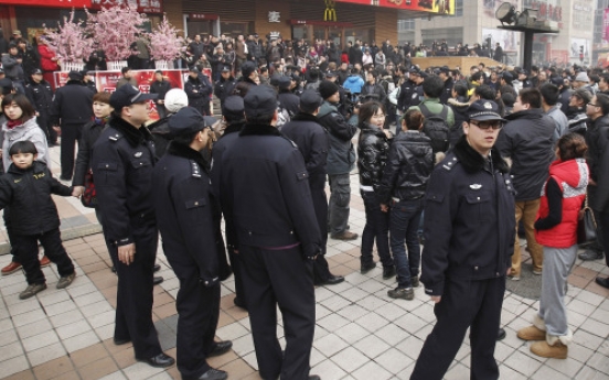 China charges subversion for protest repostings