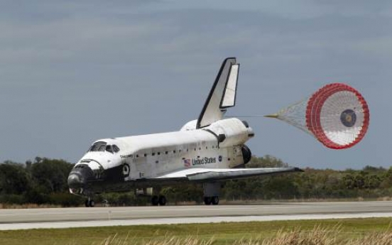 Discovery lands after final voyage