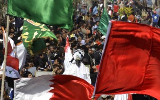 Bahrain curfew as uprising surges
