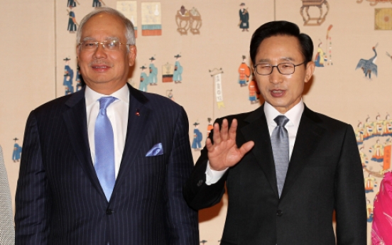 President Lee pledges to share river development experience with Malaysia