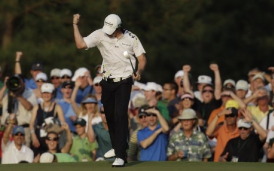 McIlroy clings to Masters lead