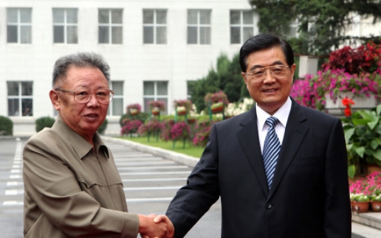 Kim, Hu discuss widening economic cooperation