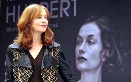 Huppert shows unknown sides in Seoul