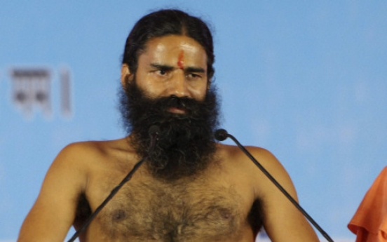 Police break up yoga guru’s hunger strike