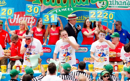 Man eats 62 hot dogs in 10 minutes