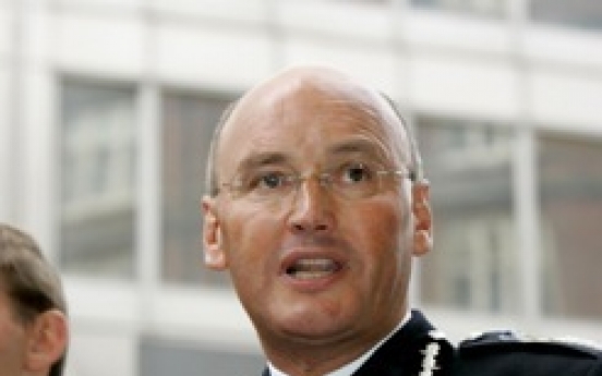 British police chief quits over phone-hacking scandal