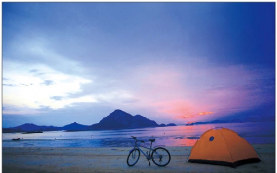 Ride bikes in red sunsets on Seonyu Island