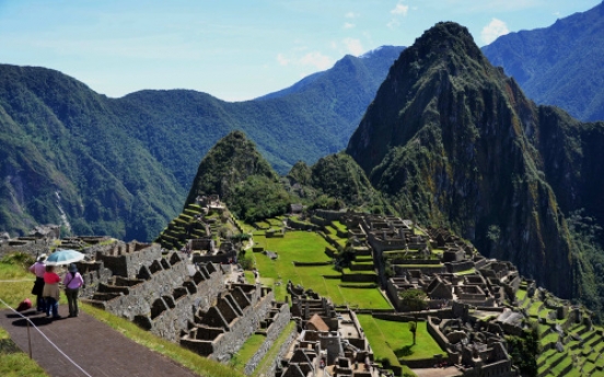 A century after rediscovery, Machu Picchu still dazzles, which may be its downfall