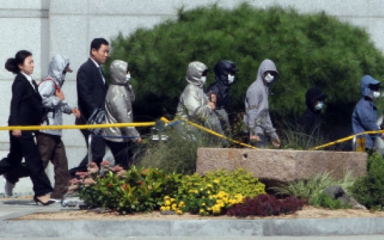 N.K. defector claims father sent spies here