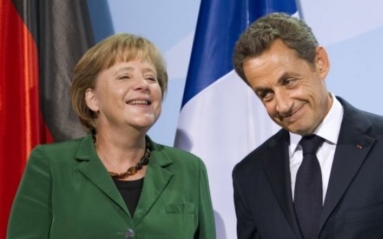 Merkel, Sarkozy reach agreement on bank sector