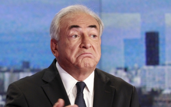 Strauss-Kahn suspected phone hacking: associates