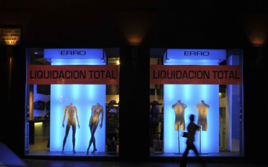 Spain’s ailing retailers slash prices to lure shoppers