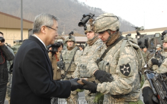 Kim visits U.S. base, says alliance firm against N.K.