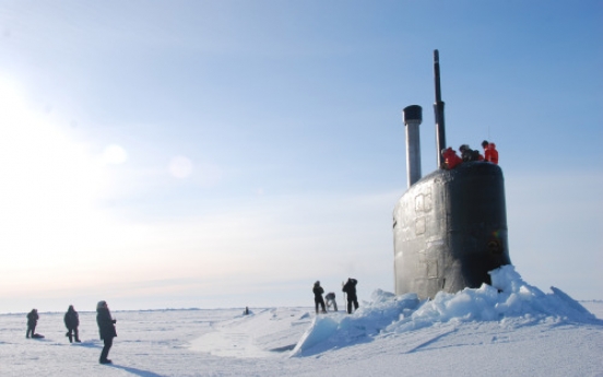 As ice cap melts, militaries vie for Arctic edge