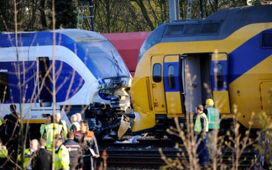 60 injured in Amsterdam two-train crash: police
