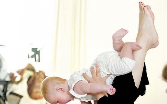 Mom and baby yoga not a stretch, participants say