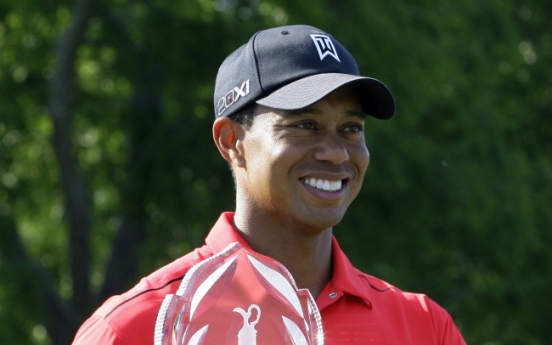 Tiger adds epic shot, dramatic win to his legend