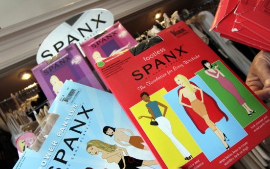 Spanx squeezes into tony shopping malls