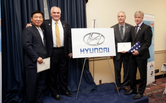 Congressmen present U.S. flag to Hyundai Motor for charity