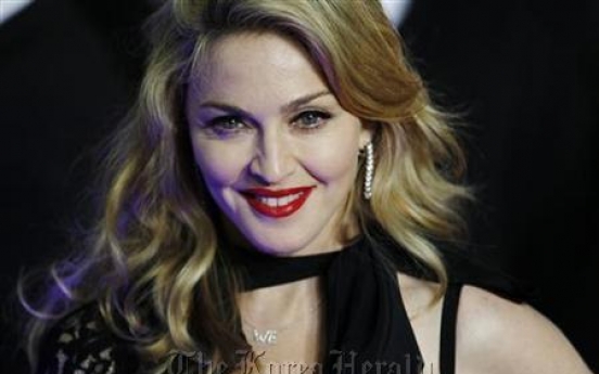 Madonna tells fans to vote for ‘black Muslim’ Obama