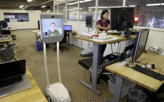 Telepresence robots allow employees to ‘beam’ into work