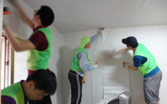 Wallpapering for needy households