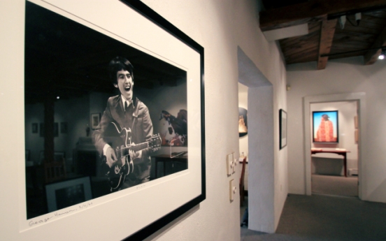 U.S. exhibit shines light on rare Beatles photos