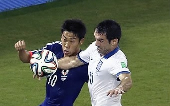 [World Cup] Scoreless draw keeps Japan and Greece alive
