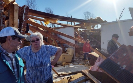 Christmastime tornadoes ravage US South, killing at least 14