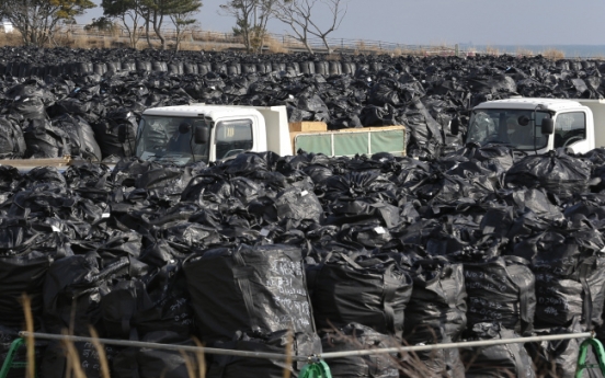 Fukushima 'decontamination troops' often exploited, shunned