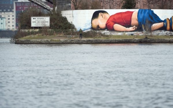 Graffiti artwork of drowned Aylan highlights refugees’ plight