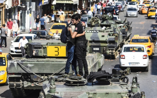 Erdogan reasserts control as Turkey coup bid falters
