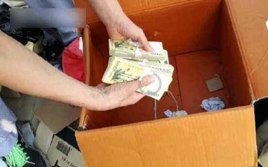 Woman accidentally throws away W20m cash