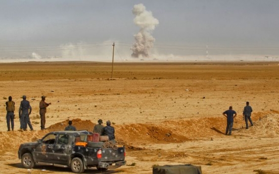 Inside Mosul, tense wait under the clouds of war
