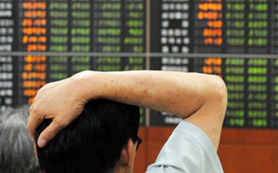 Korean shares up in late morning trade