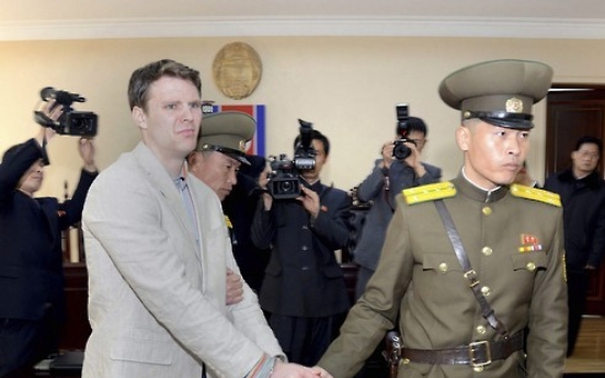 US student freed from NK in state of 'coma'