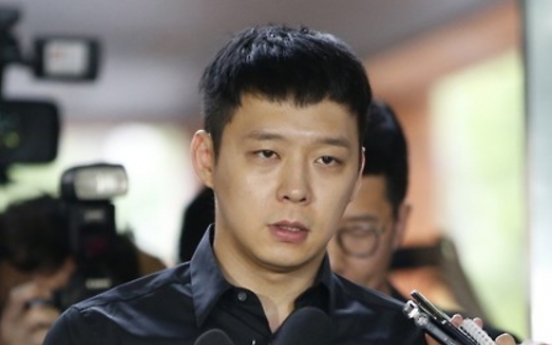Woman in false accusations case involving Park Yoo-chun found not guilty